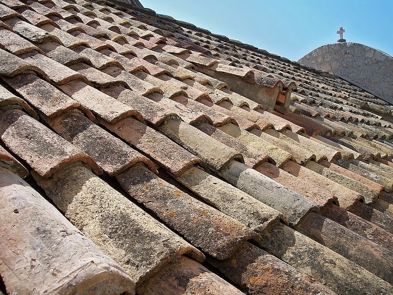 After full tile lift and reset on a Silverleaf Scottsdale luxury residence showing pristine, newly aligned Mediterranean terracotta tile roofing