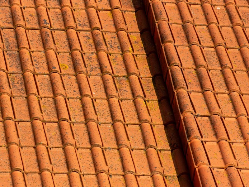 Before tile lift and reset on a Silverleaf Scottsdale residence showing aged, weathered, and sun-faded clay tile roofing