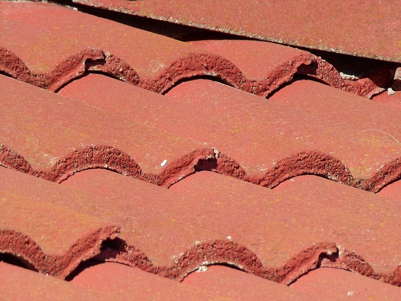 After tile repair showing brand new flawless Spanish red clay barrel tiles installed in Gainey Ranch Scottsdale